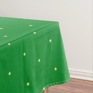 Yellow star pattern on green tablecloth