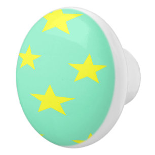 Yellow stars on turquoise ceramic knob