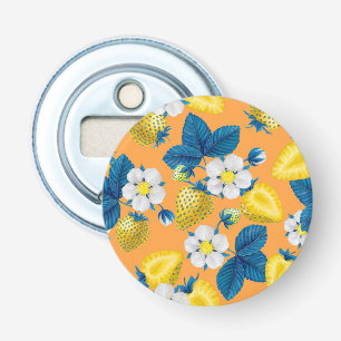 Yellow strawberries on orange bottle opener
