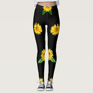 Yellow sunflower on dark black background leggings