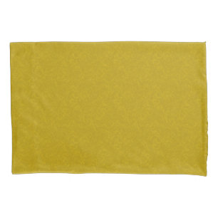 Yellow textured surface with  swirling pattern pillowcase