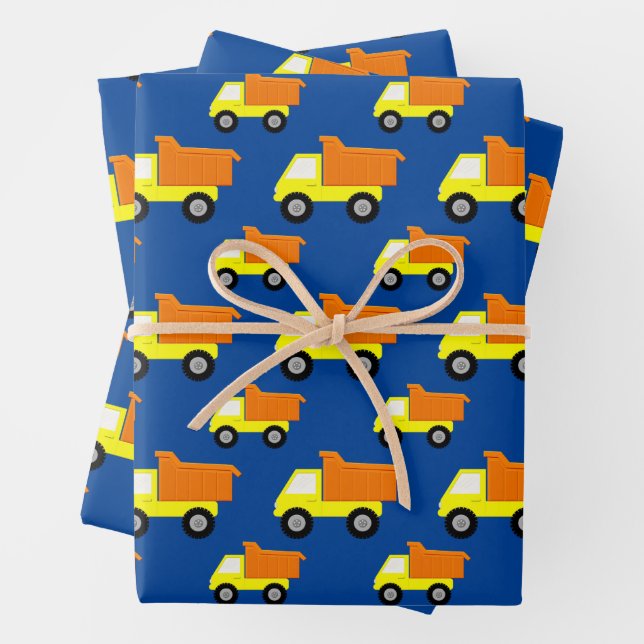 Yellow Toy Construction Truck On Blue Wrapping Paper Sheet (In situ)