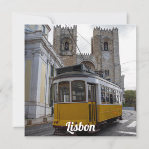 Yellow tram on Lisbon Cathedral in Portugal