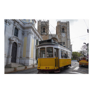 Yellow tram on Lisbon Cathedral in Portugal Photo Print