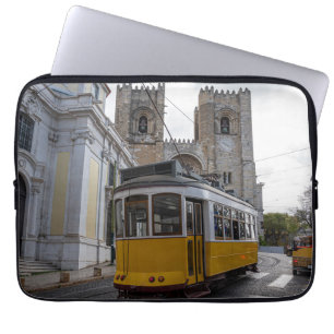 Yellow tram on Lisbon Cathedral Portugal Laptop Sleeve