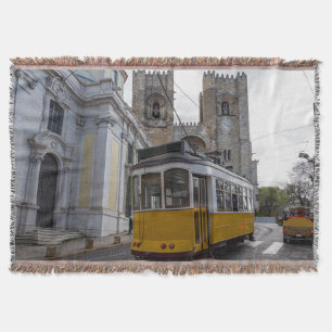 Yellow tram on Lisbon Cathedral Portugal Throw Blanket