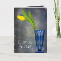 yellow tulip in blue glass birthday