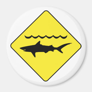 Yellow 'warning sharks' sign round magnet