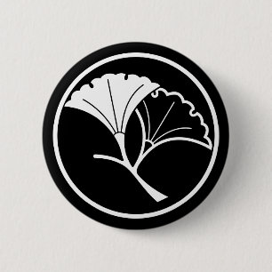 Yin and yang ginkgo leaves in threadlike ring 6 cm round badge