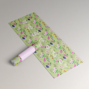 Yoga for women with delicate flowers on green mat