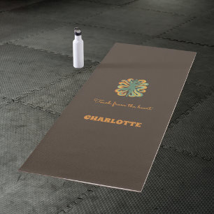 Yoga pose swirls retro brown orange name slogan  yoga mat