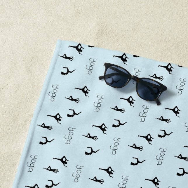 Yoga poses and text pattern on blue beach towel (In Situ)