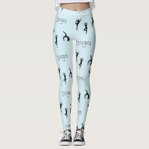 Yoga poses and text pattern on blue leggings