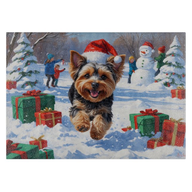 Yorkipoo Running in Snow with Christmas Hat Cutting Board (Front)