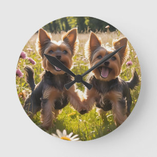 Yorkshire Terriers Playing in the Grass Round Clock