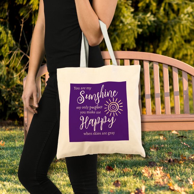 You Are My Sunshine Make Me Happy Sun Purple Tote Bag (You Are My Sunshine You Make Me Happy lyrics on a bright purple tote bag will brighten any adventure)