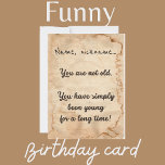 "You are not old..." birthday card<br><div class="desc">"You are not old, you have simply been young for a long time!" is a birthday card with black text on a beige papyrus background. Customise the name on the front side and the greeting on the back, plus add your own text! A fun card for a slightly older friend...</div>