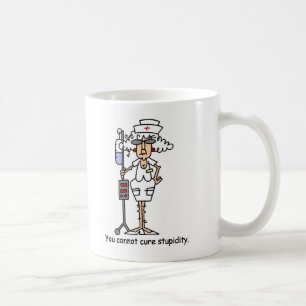 You can not cure stupidity! coffee mug