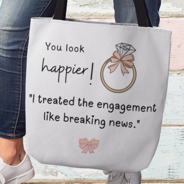 You look happier! Breaking news engagement Tote Bag (You look happier! :"I treated the engagement like breaking news." Tote bag)