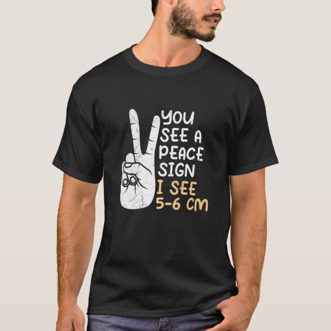 You see a Peace sign I see 5 6 cm midwife  1 T-Shirt (Front)