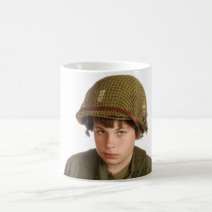 Young boy dressed as a soldier. coffee mug