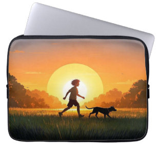 Young Boy with dog at sunset Laptop Sleeve