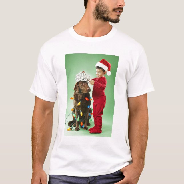 Young boy wrapping Christmas lights around a dog T-Shirt (Front)