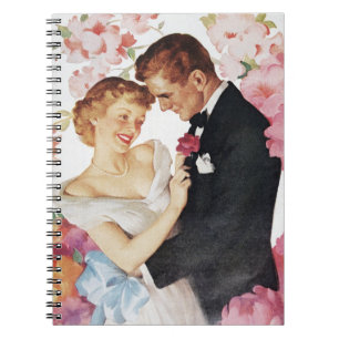 Young couple in formal wear notebook