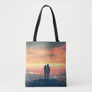 young couple standing on the roof top looking at c tote bag