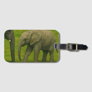 Young Elephant with Guardian in Grassy Reserve Luggage Tag