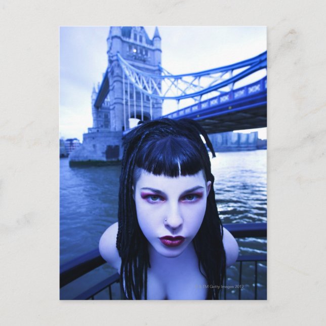 Young Goth woman leaning suggestively near Tower Postcard (Front)