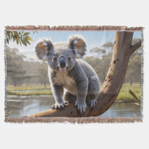 Young Koala by a Lake Throw Blanket