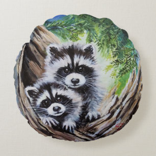 Young raccoons in tree Round throw pillow