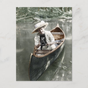 Young Woman in a Canoe with a Camera Postcard