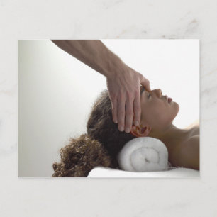 Young women enjoying a massage postcard