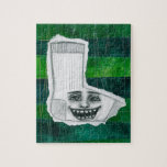 Your Lost Sock Jigsaw Puzzle<br><div class="desc">A funny pencil drawing over collage background,  featuring a funny maniacal smiling sock over green and teal.</div>
