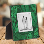 Your Photo Tropical Leaves Plaque<br><div class="desc">Made to look dimensional, a tropical leaf plant pattern creates a beautiful frame for your favourite photo on this tabletop plaque with a built-in easel. The image is put directly on the hardboard panel for a stunningly crisp image with an easy wipe clean surface. Great as a gift or to...</div>
