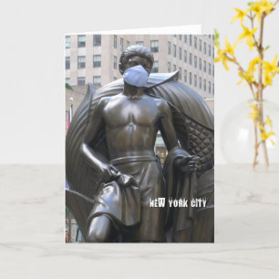 Youth statue wearing a face mask - NYC card