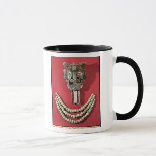 Zapotec pectoral the form of mask representing mug
