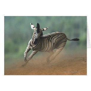 Zebra galloping over the desert landscape.