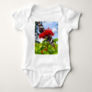Zebra longwing butterflies on red flowers baby bodysuit