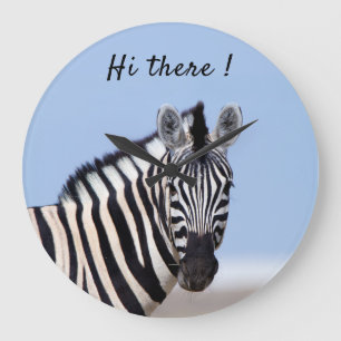 Zebra looking at you with blue sky photo large clock
